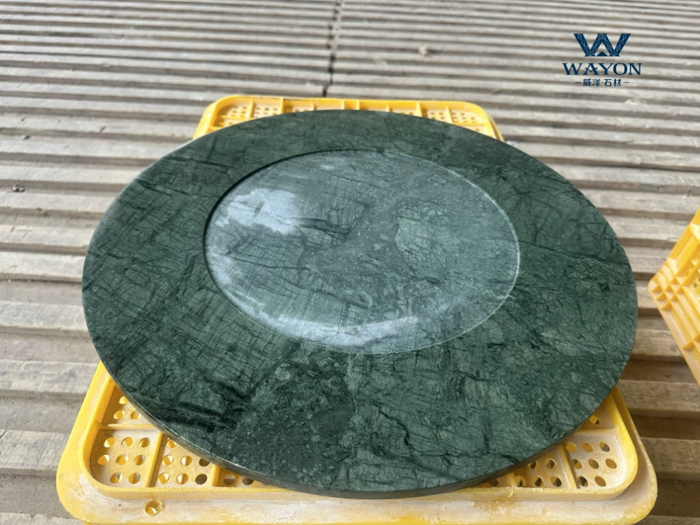 Mesa redonda de mármol verde indio